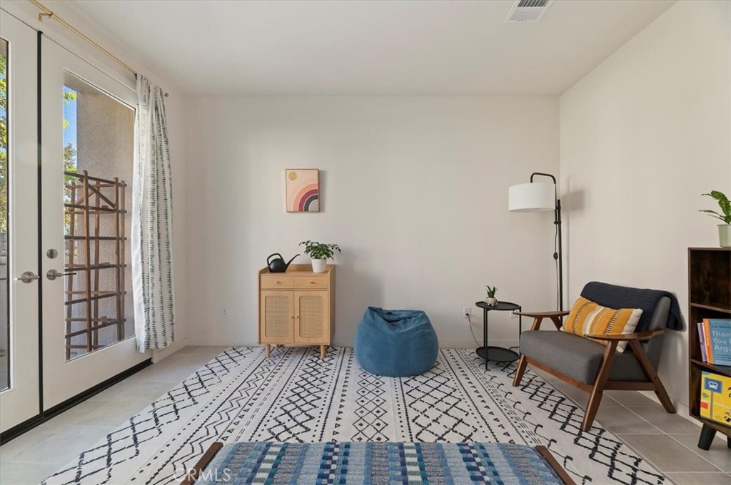 11012 Serenity Drive Rancho Cucamonga, CA 91730 - Photo 10 of 37 a room with furniture and wooden floor