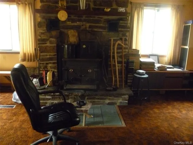 a room with furniture and window