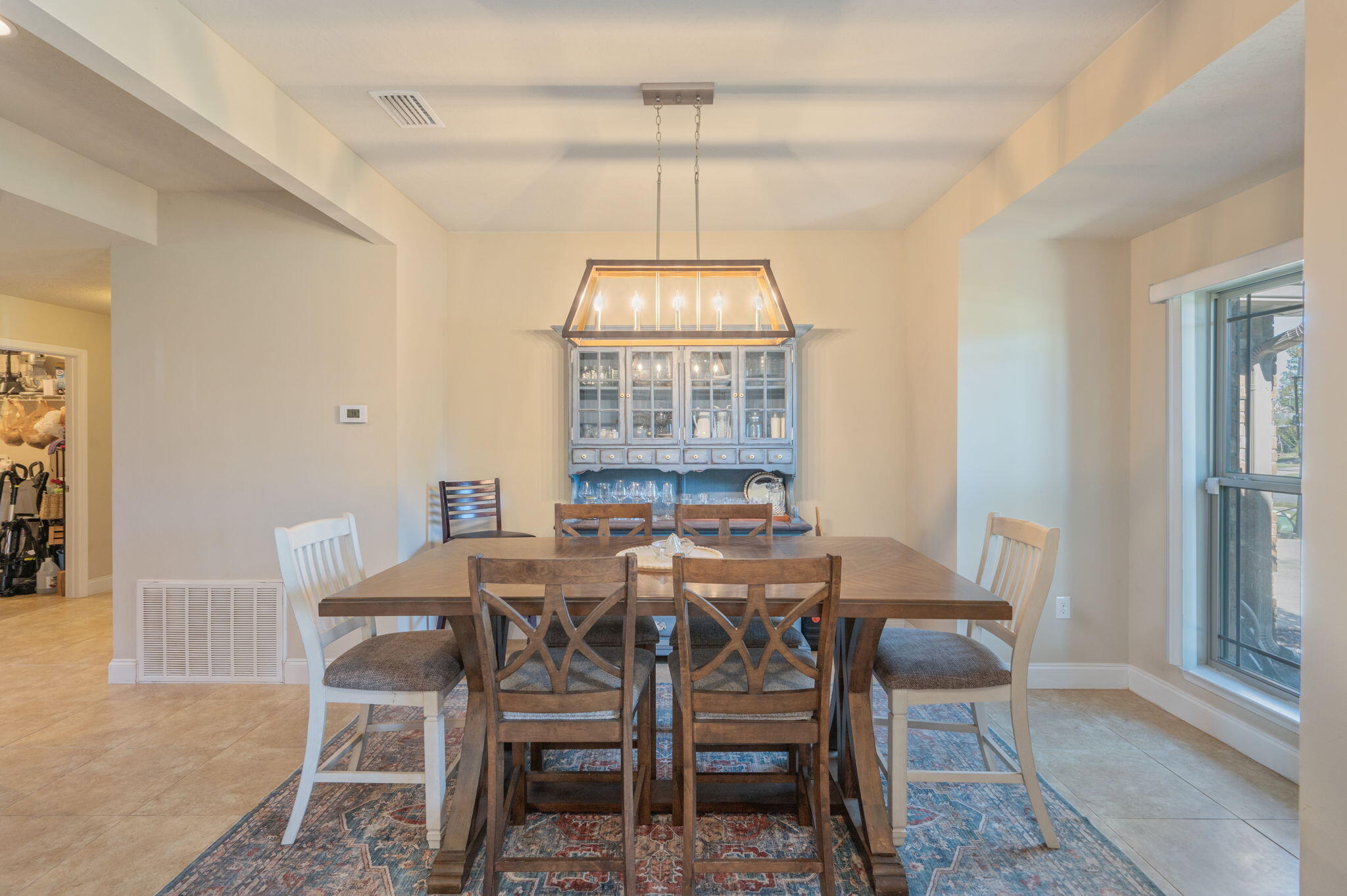 4675 Chanteuse Parkway Crestview, FL 32539 - Photo 12 of 48 a view of a dining room with furniture window and outside view