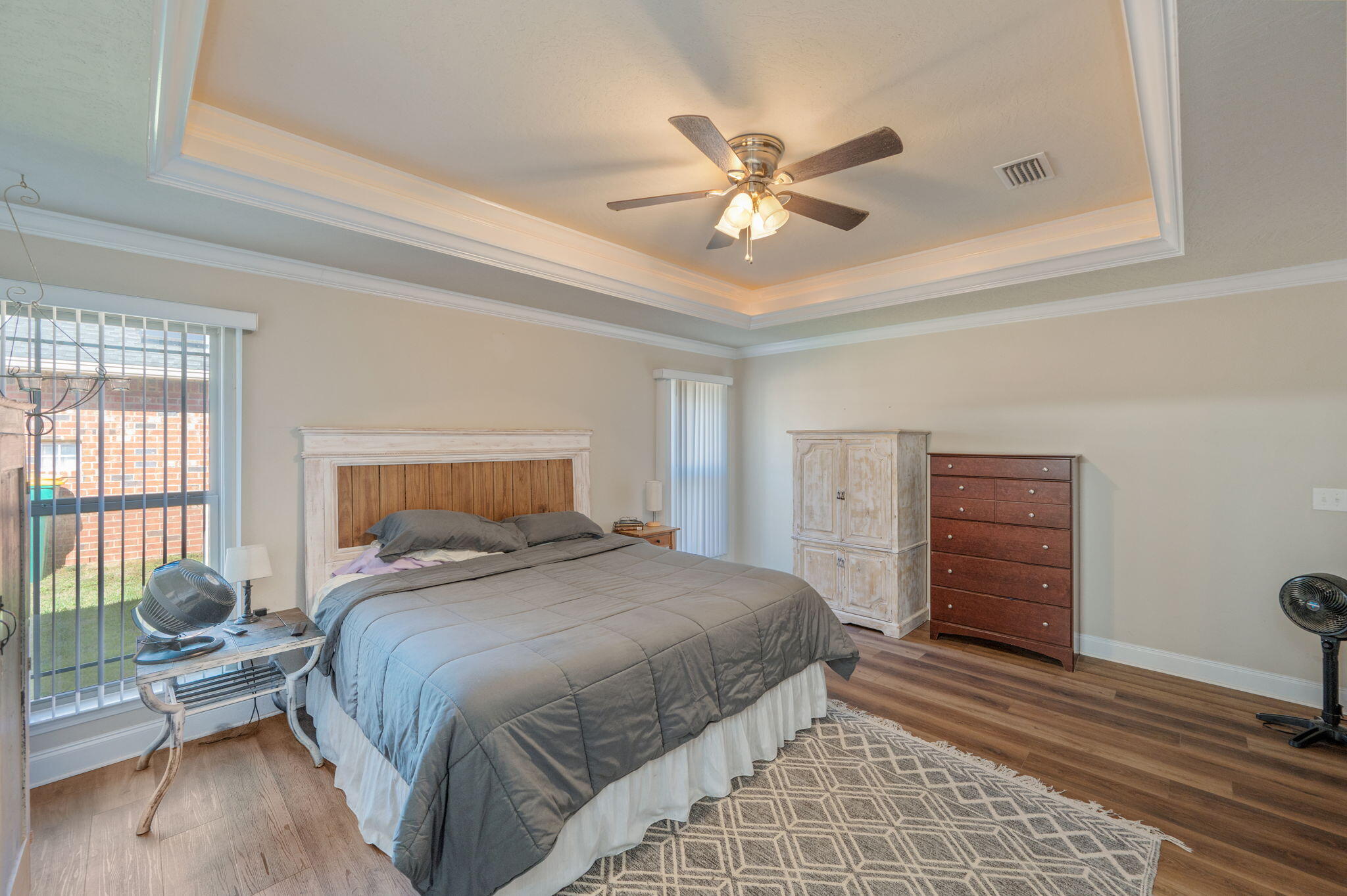 4675 Chanteuse Parkway Crestview, FL 32539 - Photo 25 of 48 a bedroom with a bed and a window