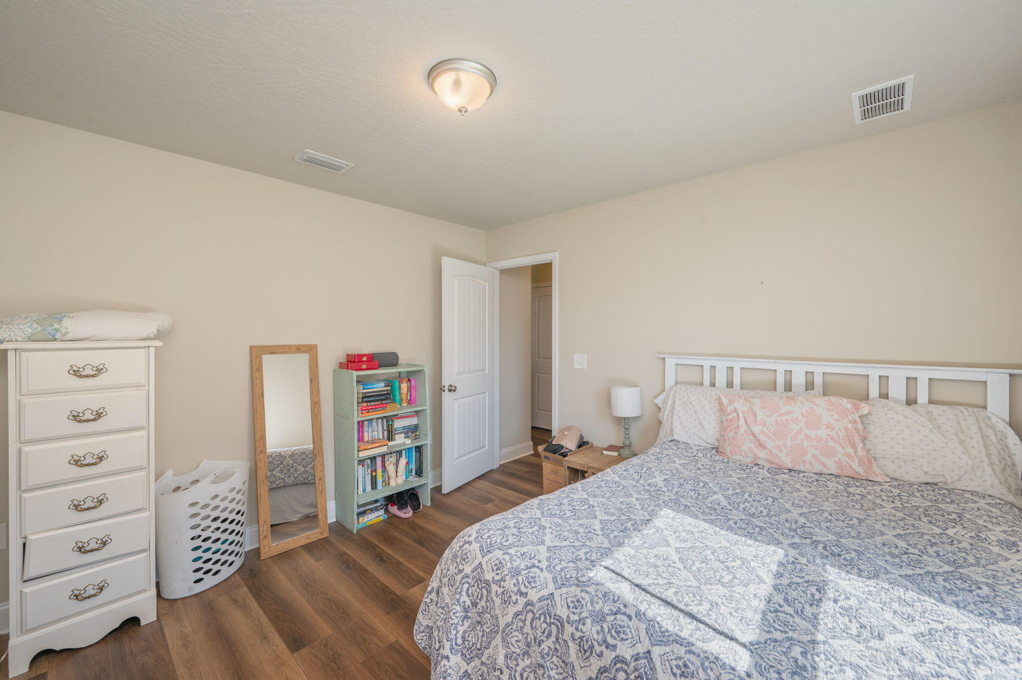 4675 Chanteuse Parkway Crestview, FL 32539 - Photo 34 of 48 a bedroom with a bed and a closet