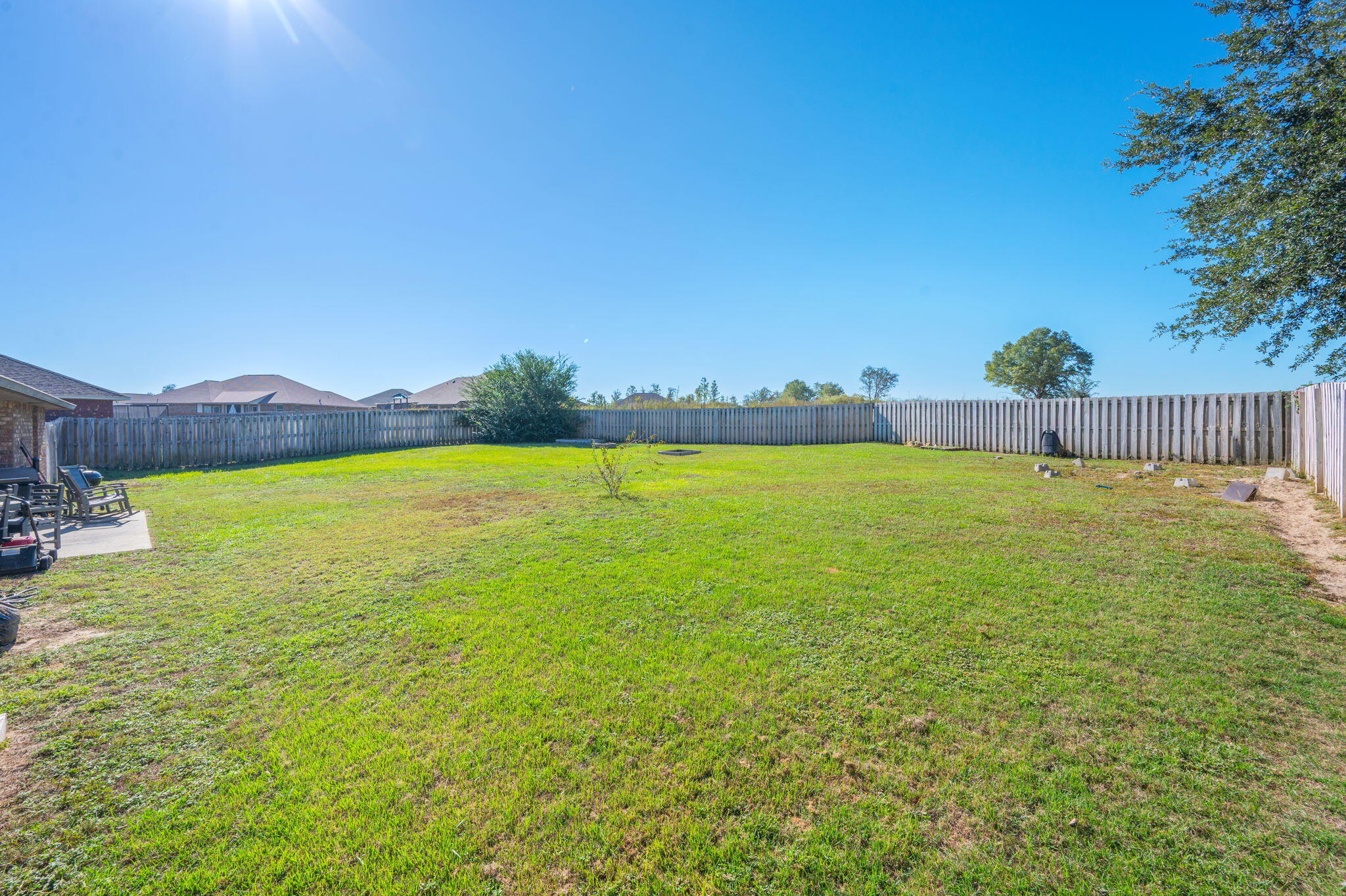 4675 Chanteuse Parkway Crestview, FL 32539 - Photo 45 of 48 a view of a swimming pool and an outdoor seating