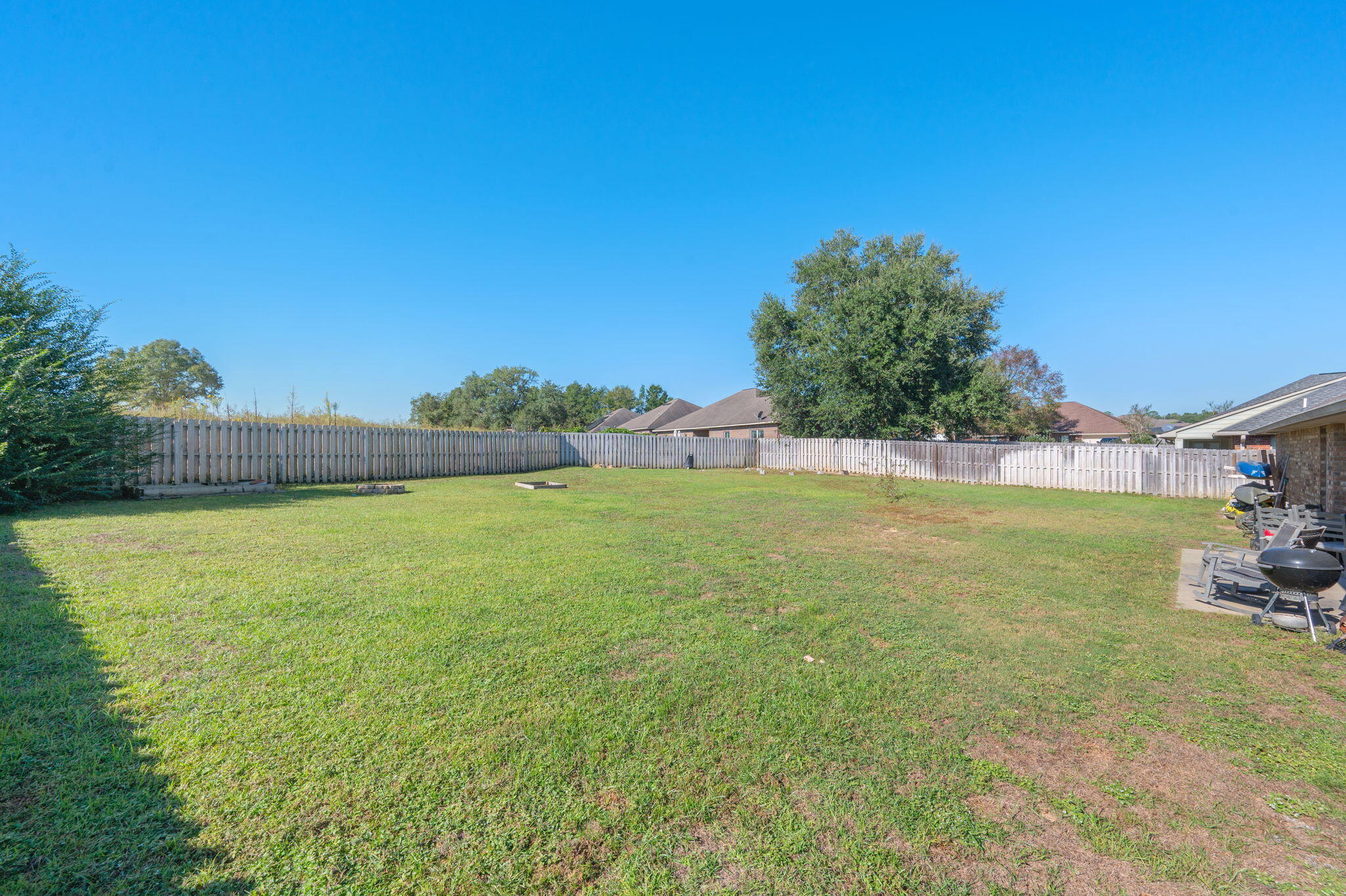 4675 Chanteuse Parkway Crestview, FL 32539 - Photo 48 of 48 a view of yard with swimming pool and green space