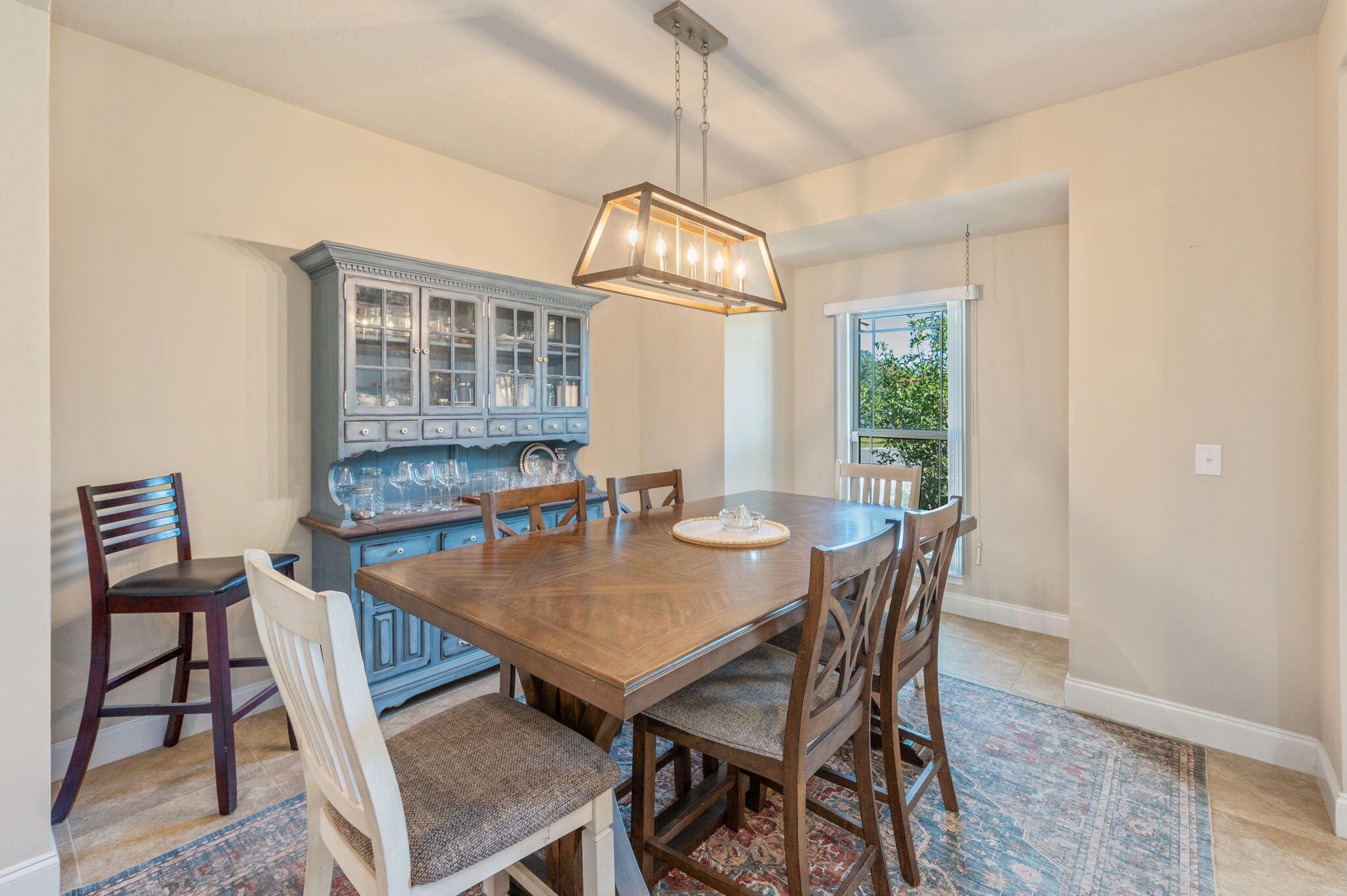 4675 Chanteuse Parkway Crestview, FL 32539 - Photo 10 of 48 a view of a dining room with furniture window and wooden floor