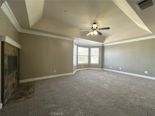a large bathroom with a large tub and sink