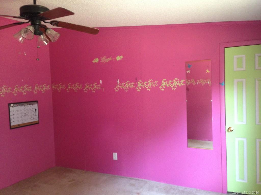 1099 South Castleview Road, Unit 67 Salisbury, NC 28146 - Photo 8 of 15 a view of a room with red walls
