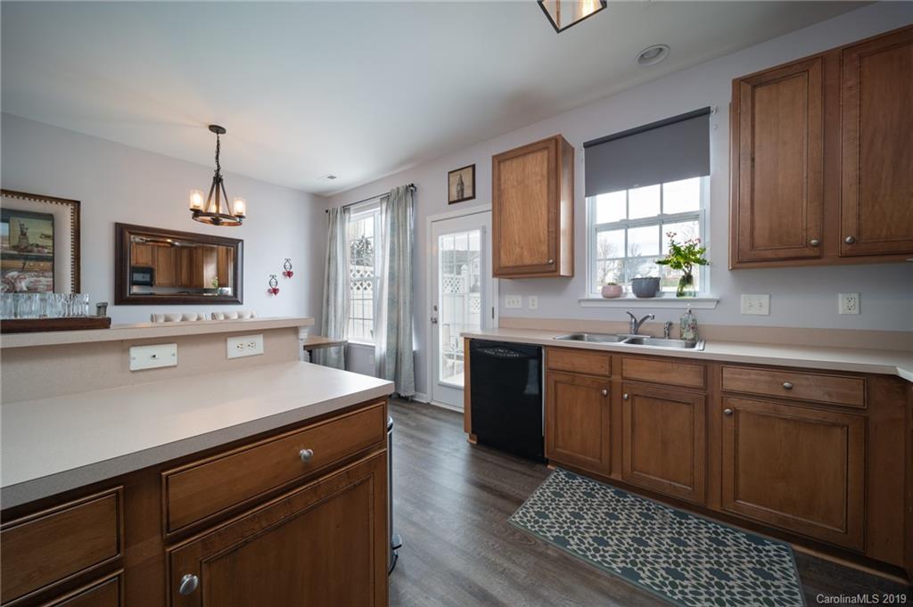 980 Copperstone Lane Fort Mill, SC 29708 - Photo 12 of 27 a kitchen with a sink cabinets and window