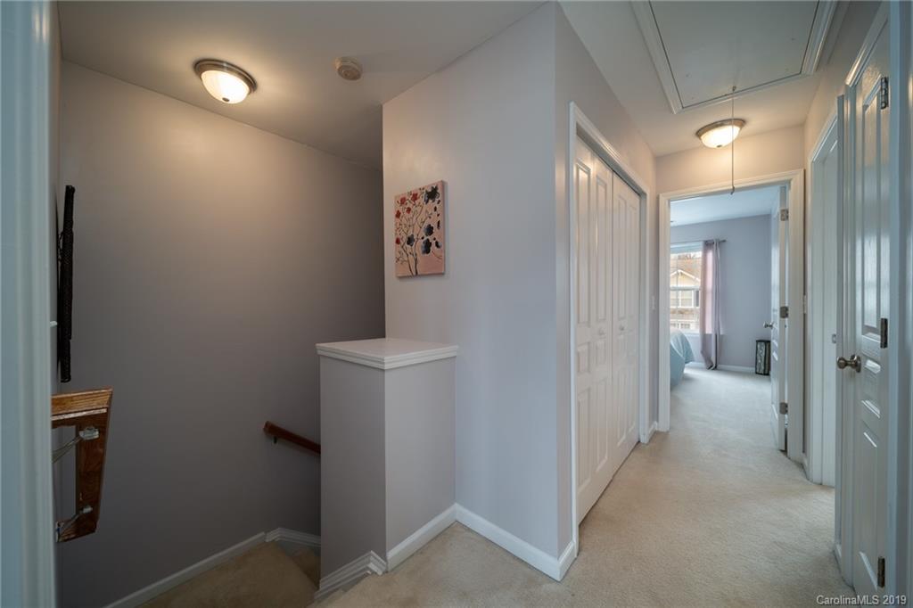 980 Copperstone Lane Fort Mill, SC 29708 - Photo 13 of 27 a view of a hallway with bathroom