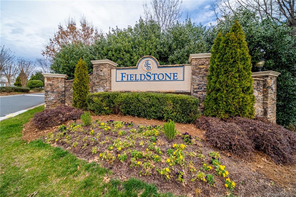 980 Copperstone Lane Fort Mill, SC 29708 - Photo 26 of 27 a view of a sign board with yard and trees