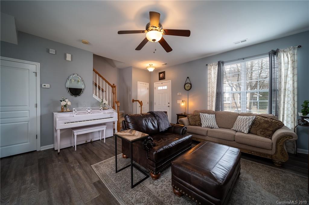 980 Copperstone Lane Fort Mill, SC 29708 - Photo 6 of 27 a living room with furniture and a large window