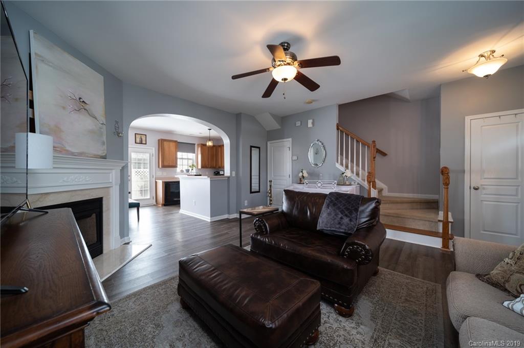 980 Copperstone Lane Fort Mill, SC 29708 - Photo 7 of 27 a living room with furniture and a fireplace