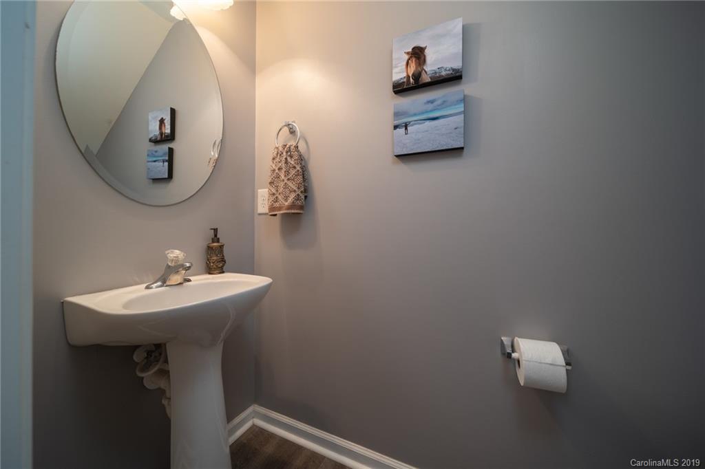 980 Copperstone Lane Fort Mill, SC 29708 - Photo 8 of 27 a bathroom with a sink and a mirror