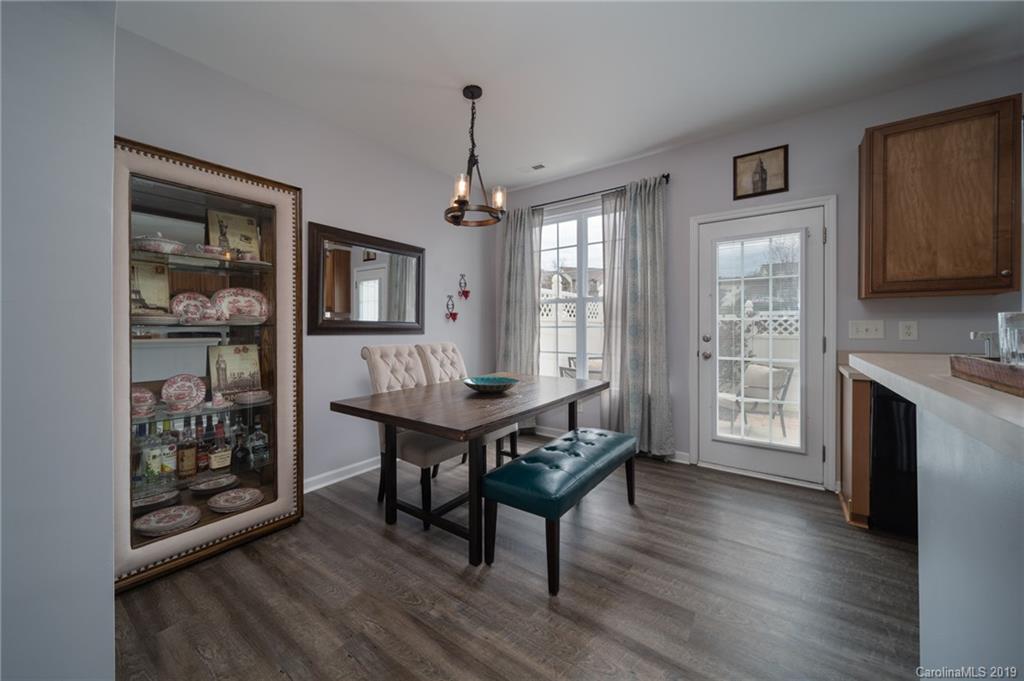 980 Copperstone Lane Fort Mill, SC 29708 - Photo 9 of 27 a view of a livingroom with furniture window and wooden floor