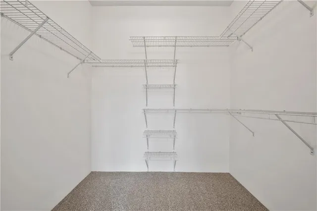 a view of an empty walk in closet