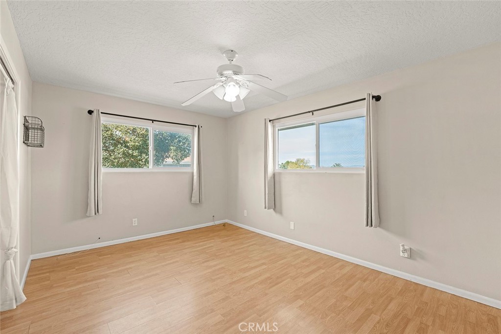 40069 East Newport Road Hemet, CA 92543 - Photo 21 of 64 a view of an empty room with a window