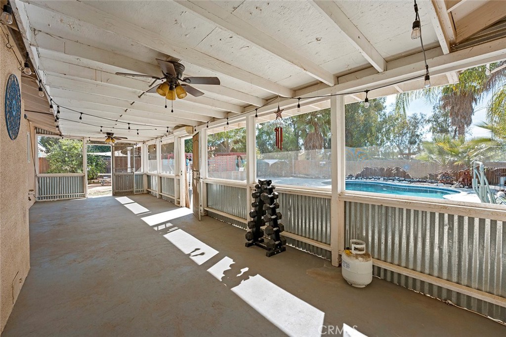 40069 East Newport Road Hemet, CA 92543 - Photo 30 of 64 a view of a porch with wooden floor