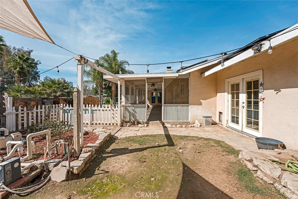 40069 East Newport Road Hemet, CA 92543 - Photo 33 of 64 a view of a house with wooden floor and outdoor seating