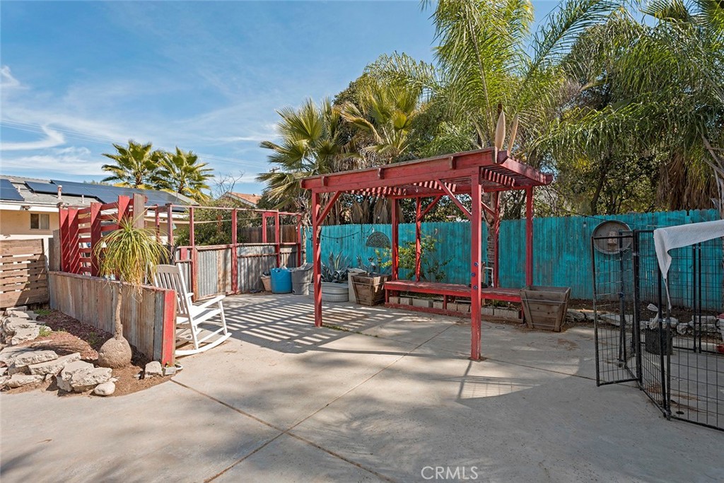 40069 East Newport Road Hemet, CA 92543 - Photo 37 of 64 a view of a chairs and tables in the patio