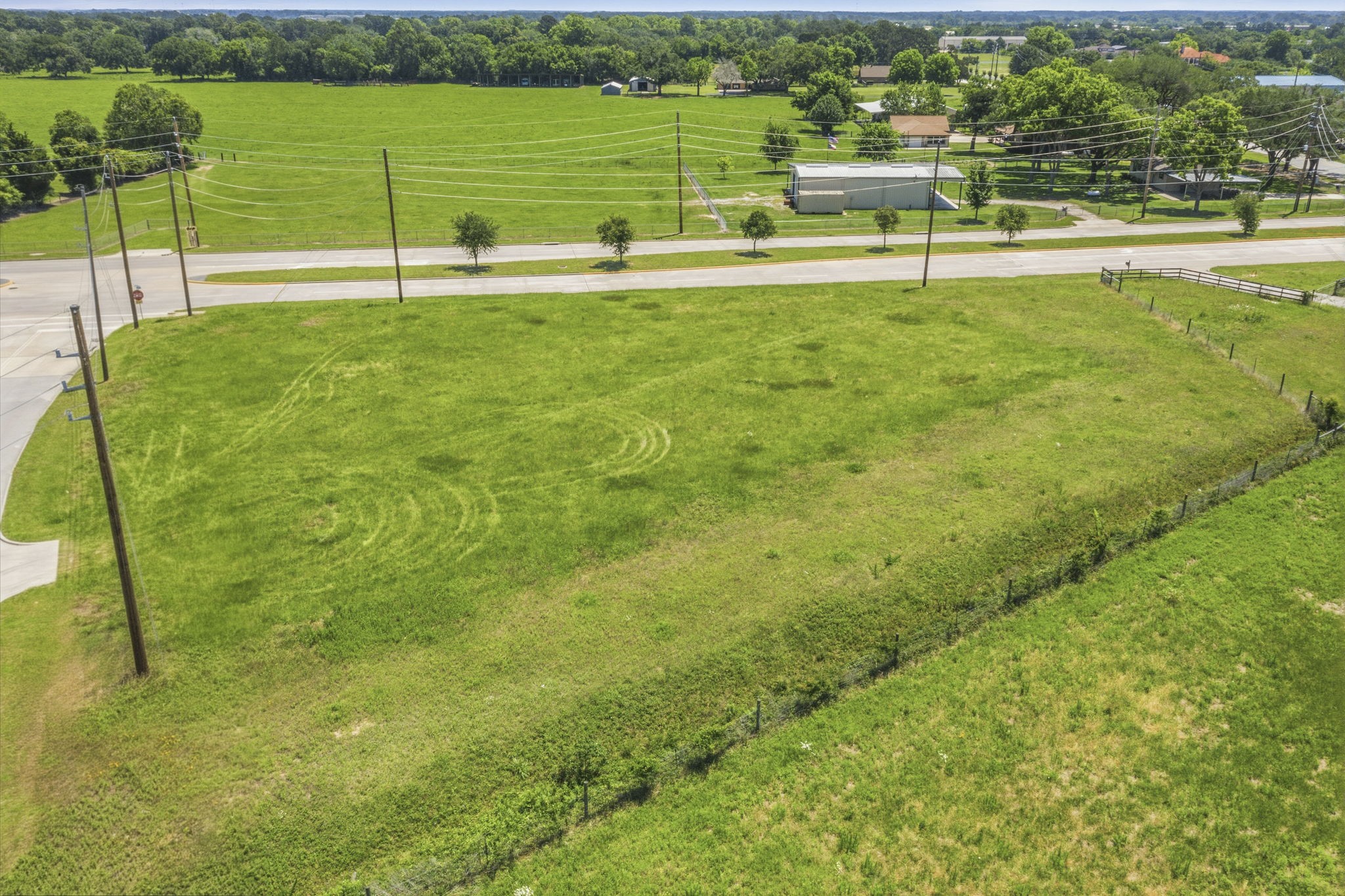 0 Mueschke Road Tomball, TX 77377 - Photo 27 of 44 a view of a golf course with a lake