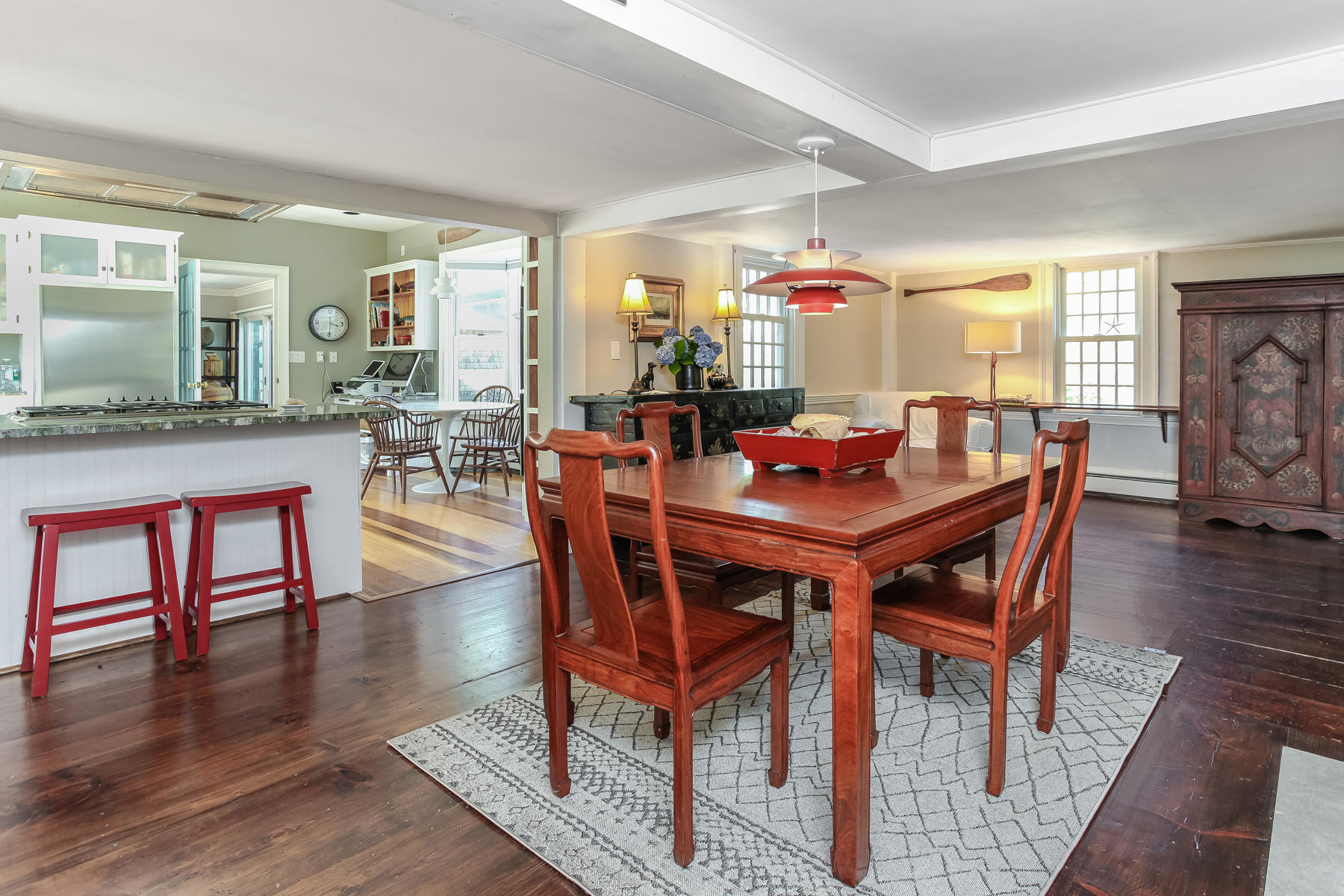 2 Plow Penny Road Bourne, MA 02532 - Photo 21 of 32 a dining room with furniture window and wooden floor