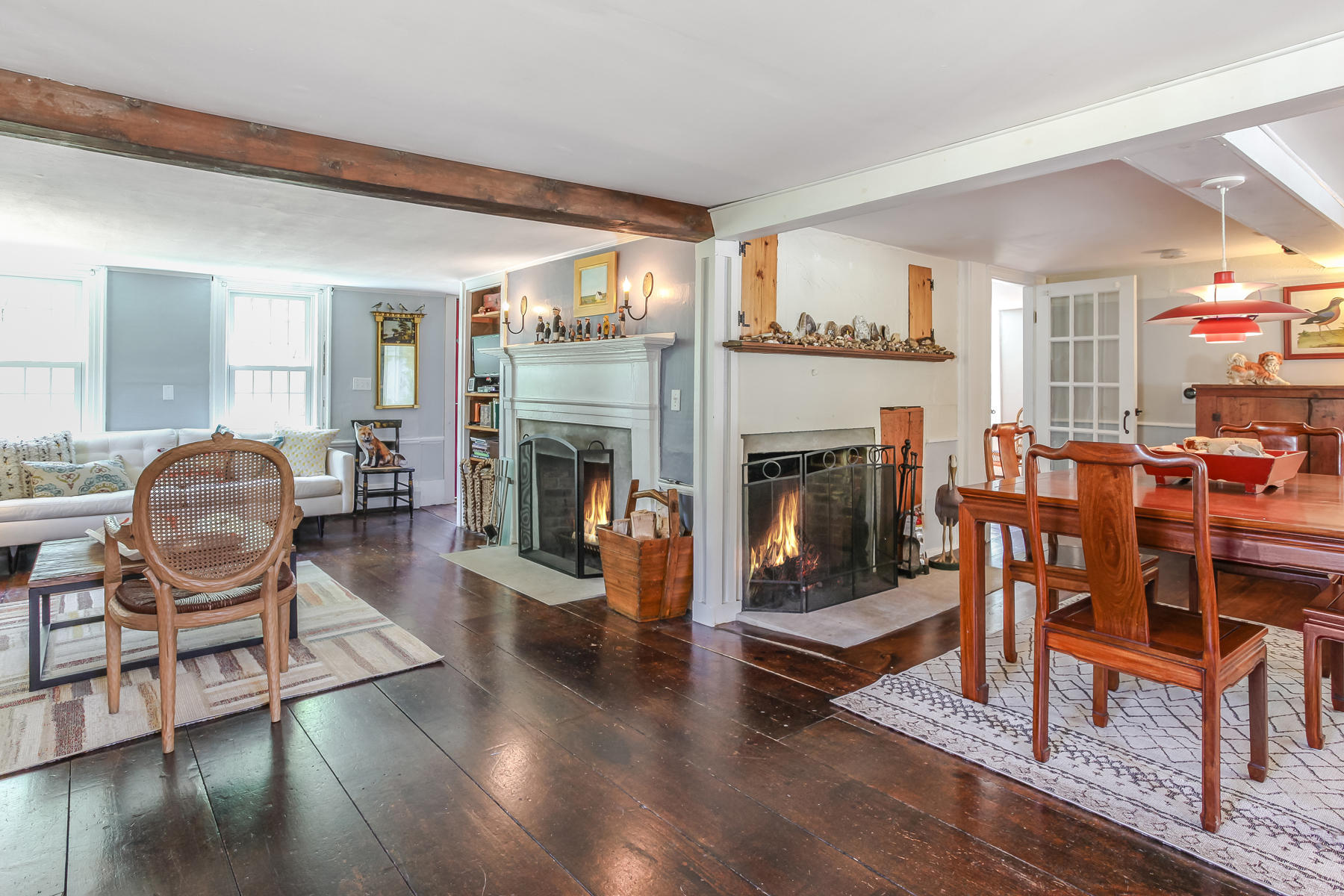 2 Plow Penny Road Bourne, MA 02532 - Photo 22 of 32 a living room with furniture and a fireplace