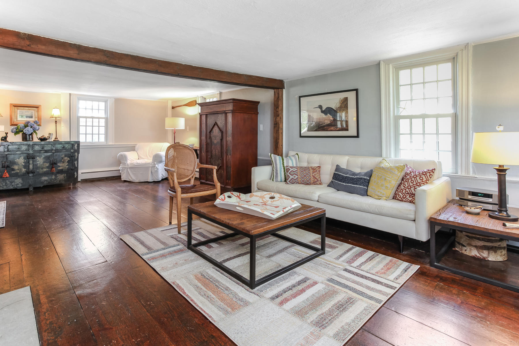 2 Plow Penny Road Bourne, MA 02532 - Photo 24 of 32 a living room with furniture a rug and a window
