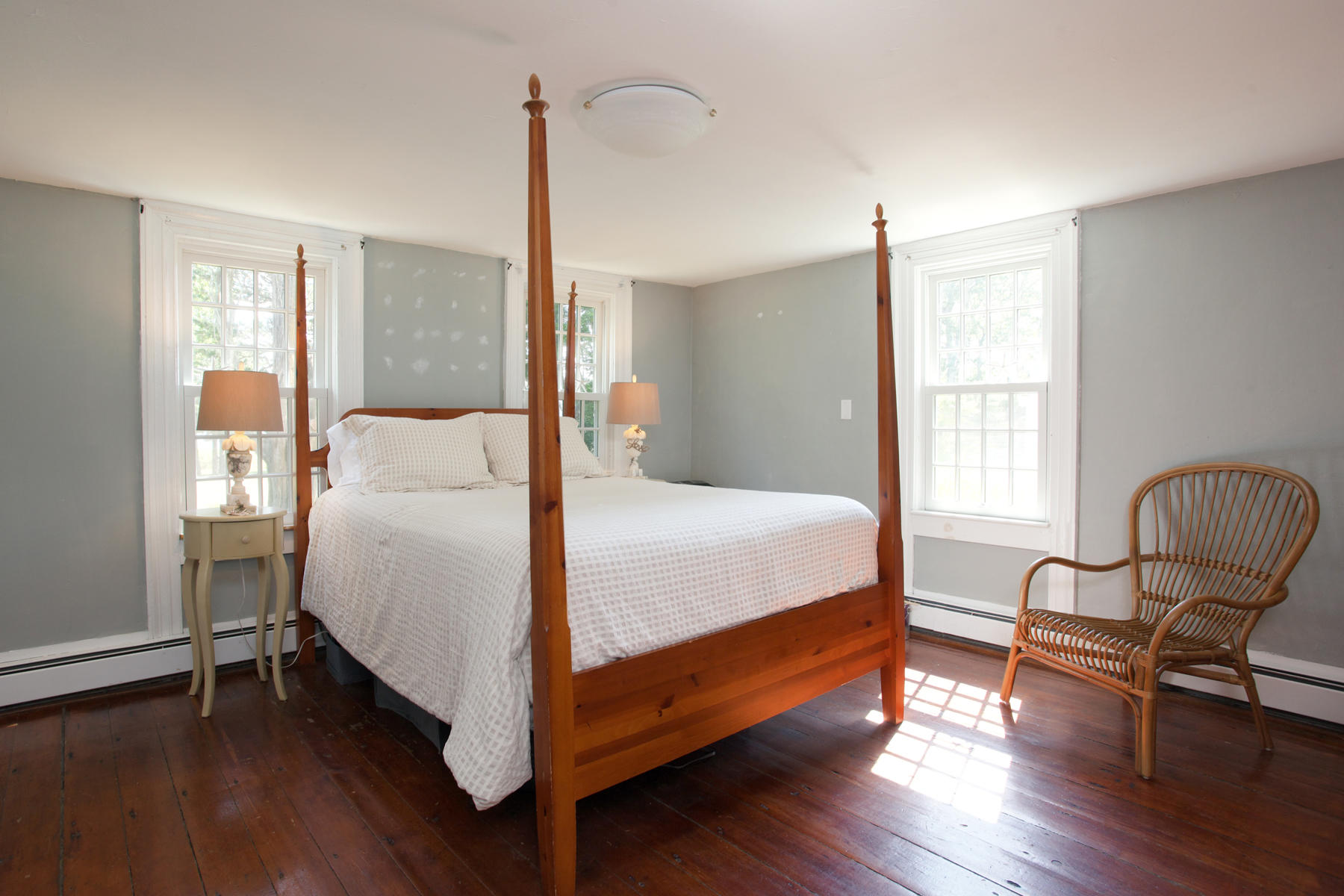 2 Plow Penny Road Bourne, MA 02532 - Photo 25 of 32 a bed room with a bed and chair