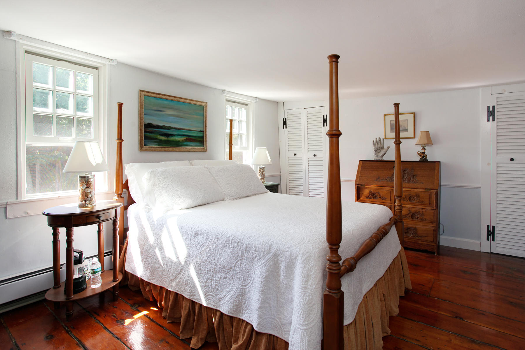 2 Plow Penny Road Bourne, MA 02532 - Photo 29 of 32 a bedroom with a bed and wooden floor