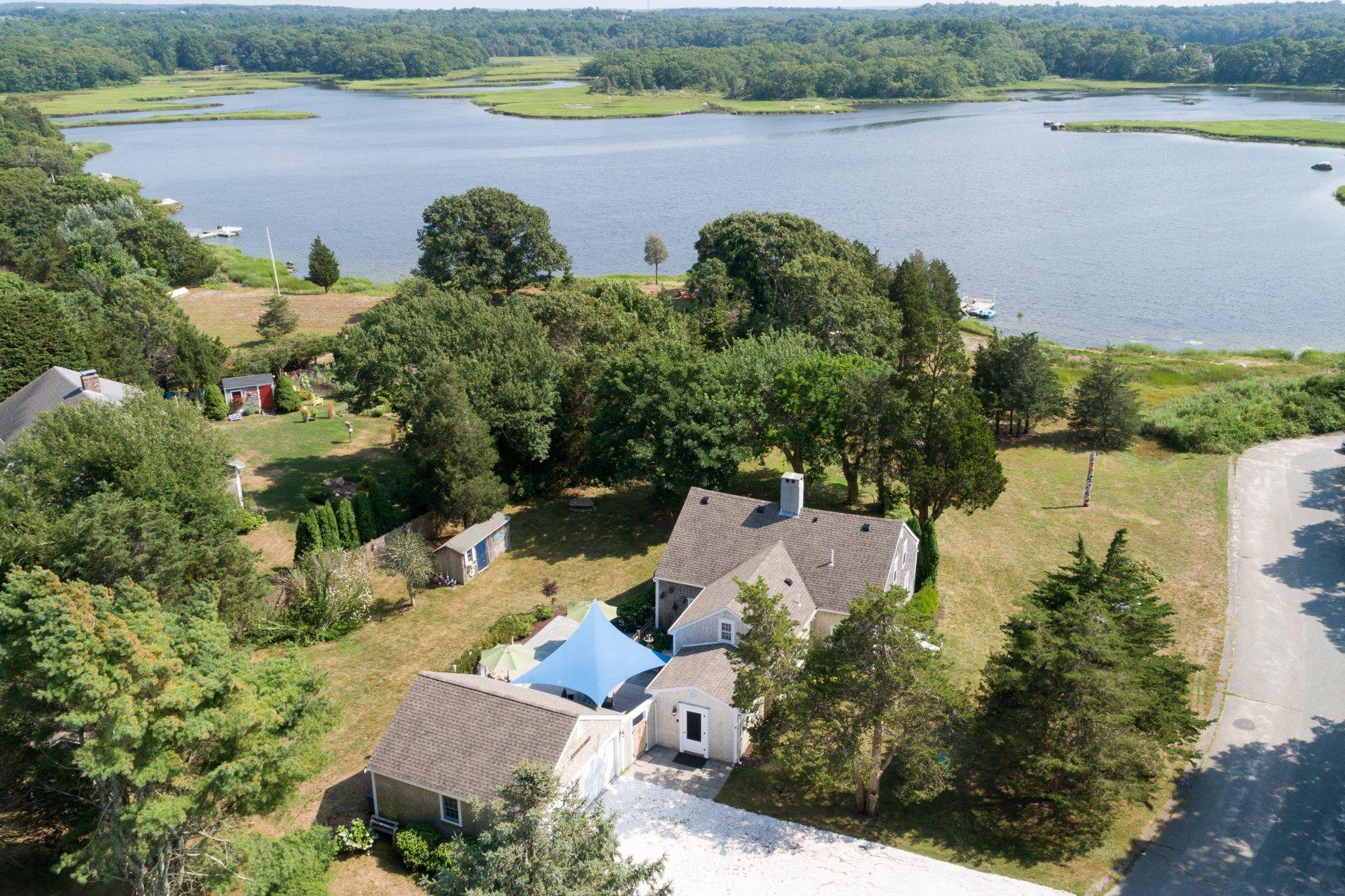 2 Plow Penny Road Bourne, MA 02532 - Photo 3 of 32 an aerial view of a house with a lake view