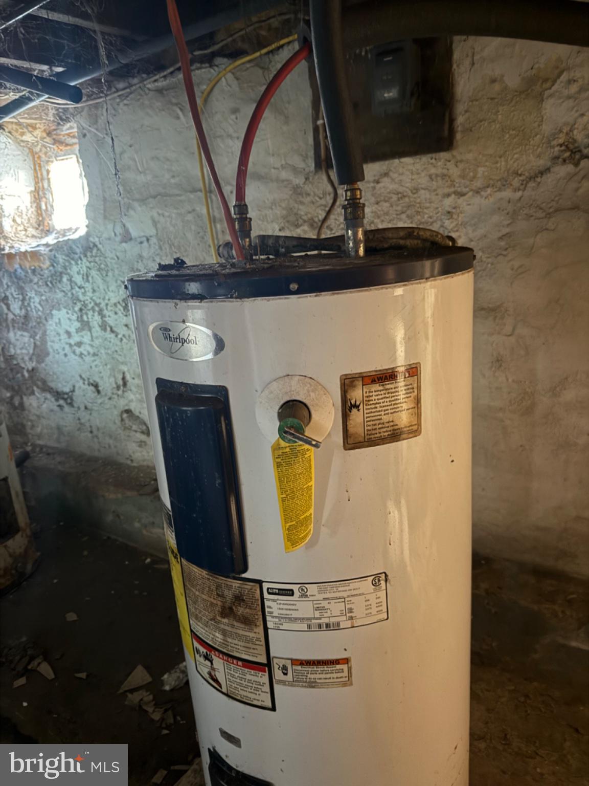 4685 Upper Road Shamokin, PA 17872 - Photo 20 of 20 Water heater in a rustic basement.