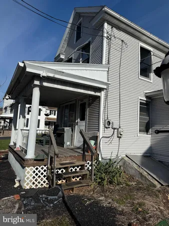 a front view of a house with glass windows