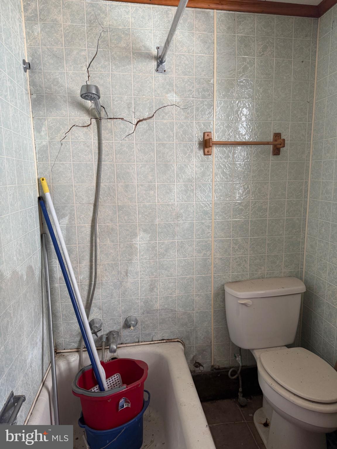 4685 Upper Road Shamokin, PA 17872 - Photo 9 of 20 Vintage bathroom with cracked tiles.