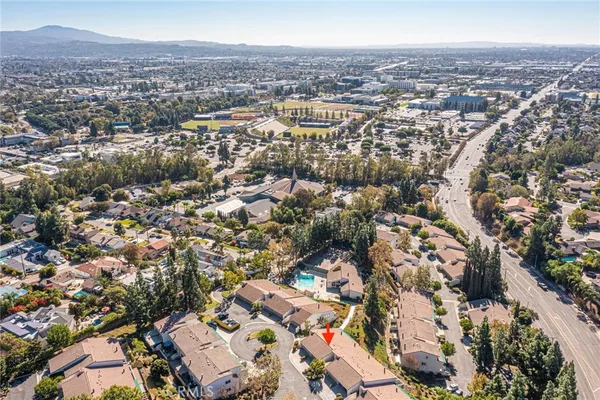an aerial view of a city with lots of residential buildings