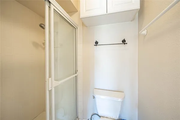 a view of a room with racks on the wall