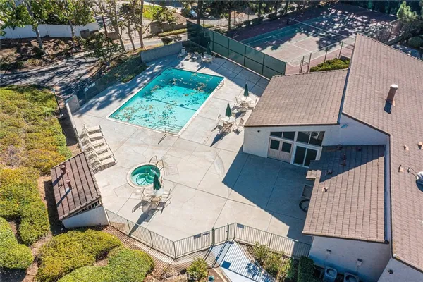 an aerial view of a house having patio