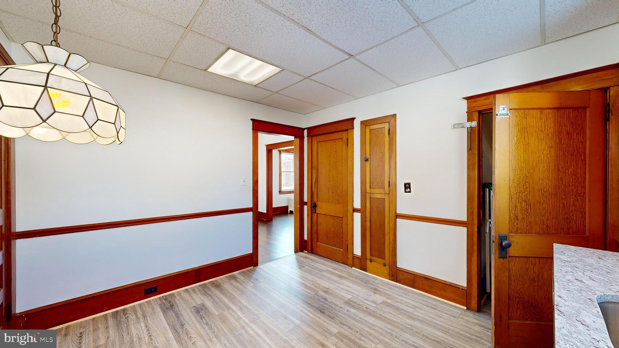 213 Broad Street St. Georges, DE 19733 - Photo 16 of 66 a view of hallway with wooden floor
