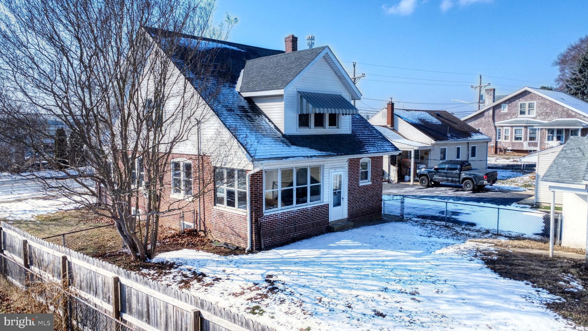 213 Broad Street St. Georges, DE 19733 - Photo 41 of 66 a view of a house with a wooden deck