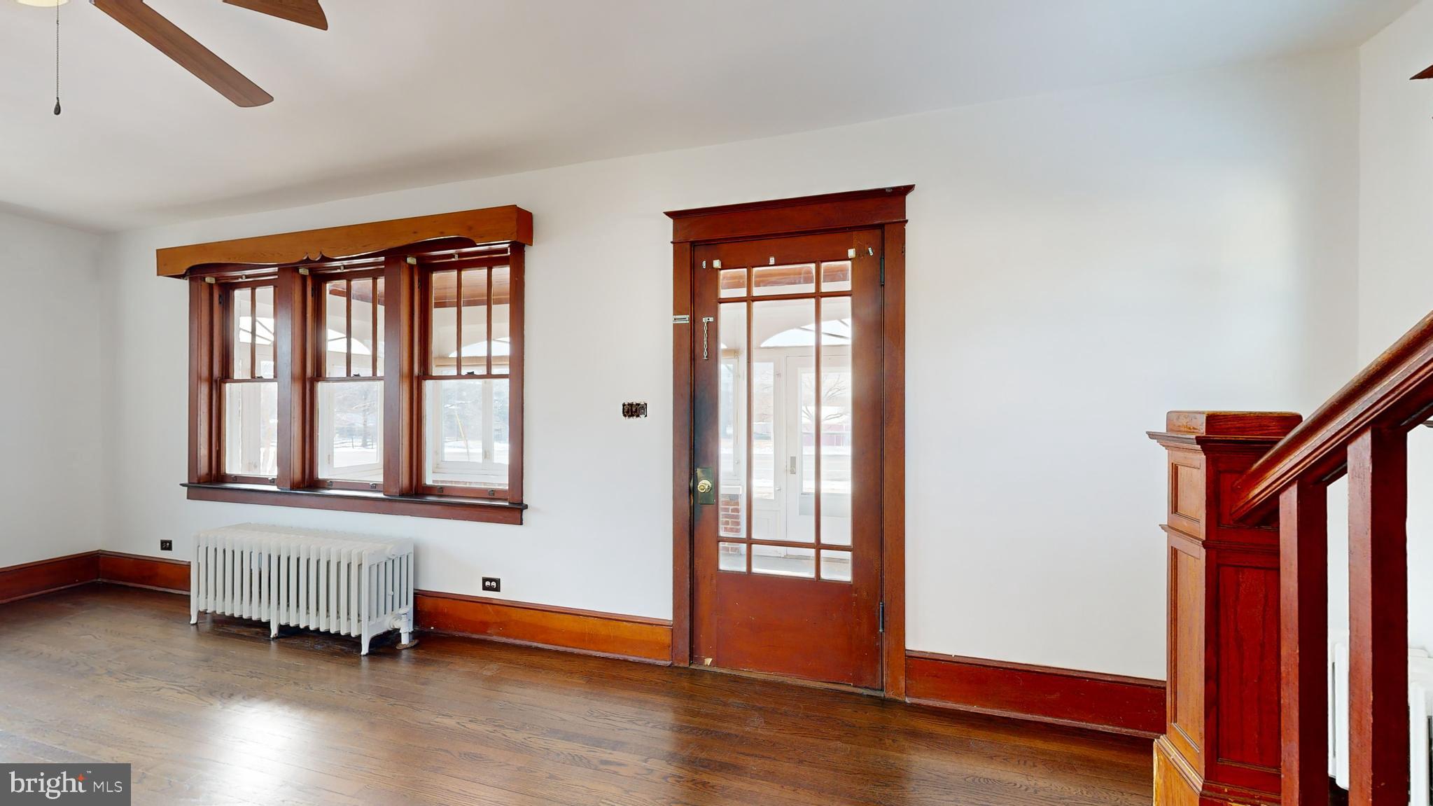 213 Broad Street St. Georges, DE 19733 - Photo 60 of 66 a view of a room with wooden floor and windows