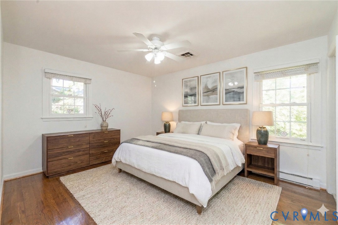 1210 Wellington Road Colonial Heights, VA 23834 - Photo 24 of 46 a bedroom with a bed lamp and a window