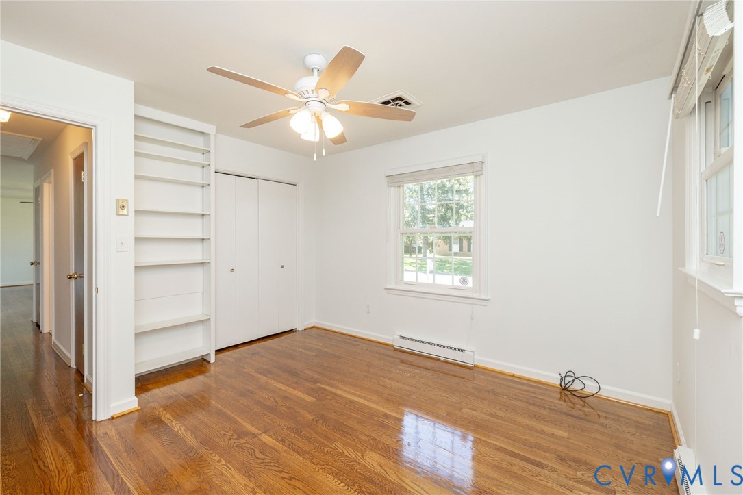 1210 Wellington Road Colonial Heights, VA 23834 - Photo 30 of 46 a view of empty room with wooden floor and fan