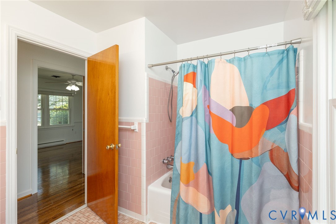 1210 Wellington Road Colonial Heights, VA 23834 - Photo 34 of 46 a blue bath tub sitting next to a bathroom
