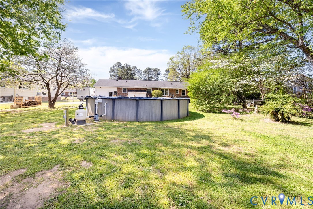 1210 Wellington Road Colonial Heights, VA 23834 - Photo 40 of 46 a view of a backyard with large trees