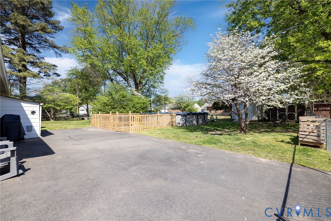 1210 Wellington Road Colonial Heights, VA 23834 - Photo 44 of 46 a view of backyard with swimming pool and sitting area