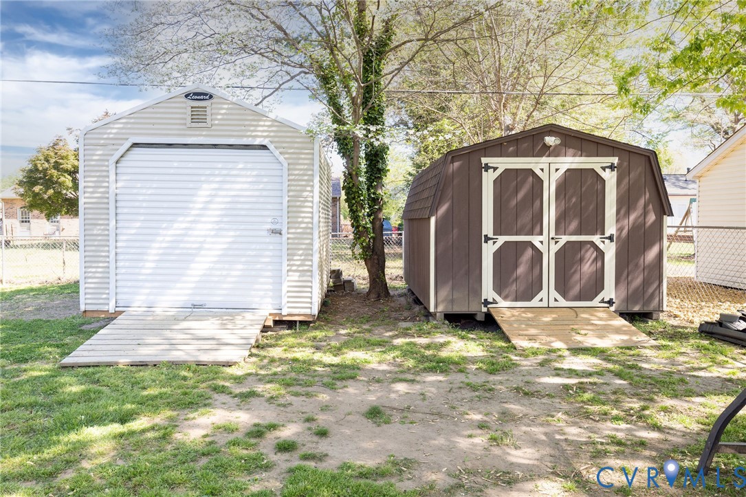 1210 Wellington Road Colonial Heights, VA 23834 - Photo 5 of 46 a front view of a house with a yard