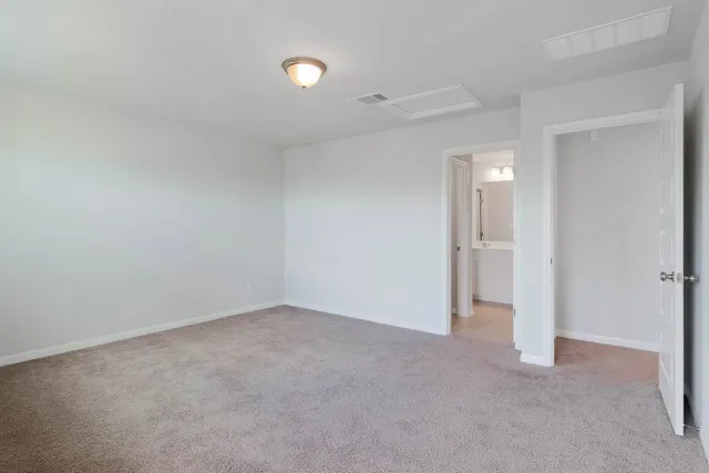 a bathroom with a double vanity sink mirror and double