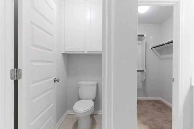 a bathroom with a shower and a sink
