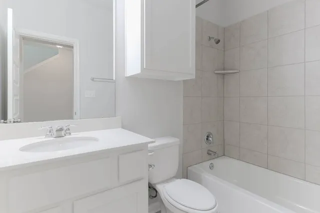 a kitchen with stainless steel appliances a refrigerator stove microwave and sink