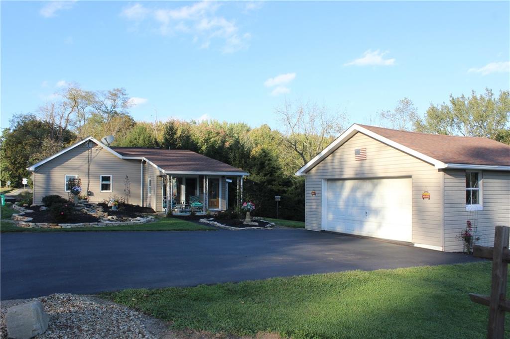1092 Old State Road New Castle, PA 16101 - Photo 1 of 12 a view of outdoor space yard and front view of a house