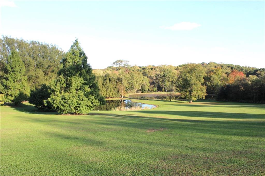 1092 Old State Road New Castle, PA 16101 - Photo 5 of 12 a view of a golf course with a lake