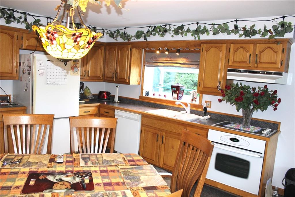1092 Old State Road New Castle, PA 16101 - Photo 6 of 12 a kitchen with a stove and a sink